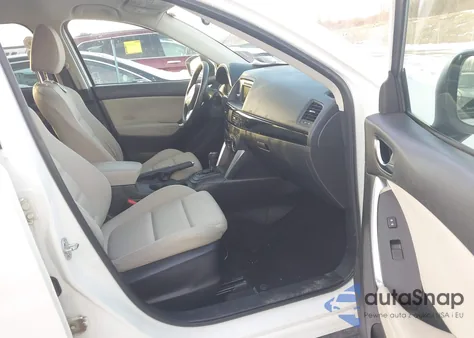 2014 Mazda Cx-5 Touring z USA, uszkodzony, nr VIN JM3KE2CY9E0350474